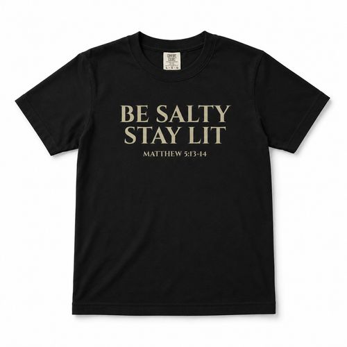 Black “Be Salty Stay Lit” youth Christian t-shirt featuring Matthew 5:13–14 in a clean front-facing product mockup.