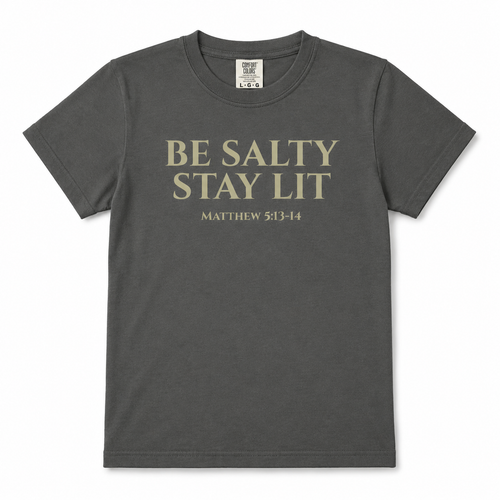 Pepper gray heathered “Be Salty Stay Lit” youth Christian t-shirt featuring Matthew 5:13–14 in a clean front-facing product mockup.