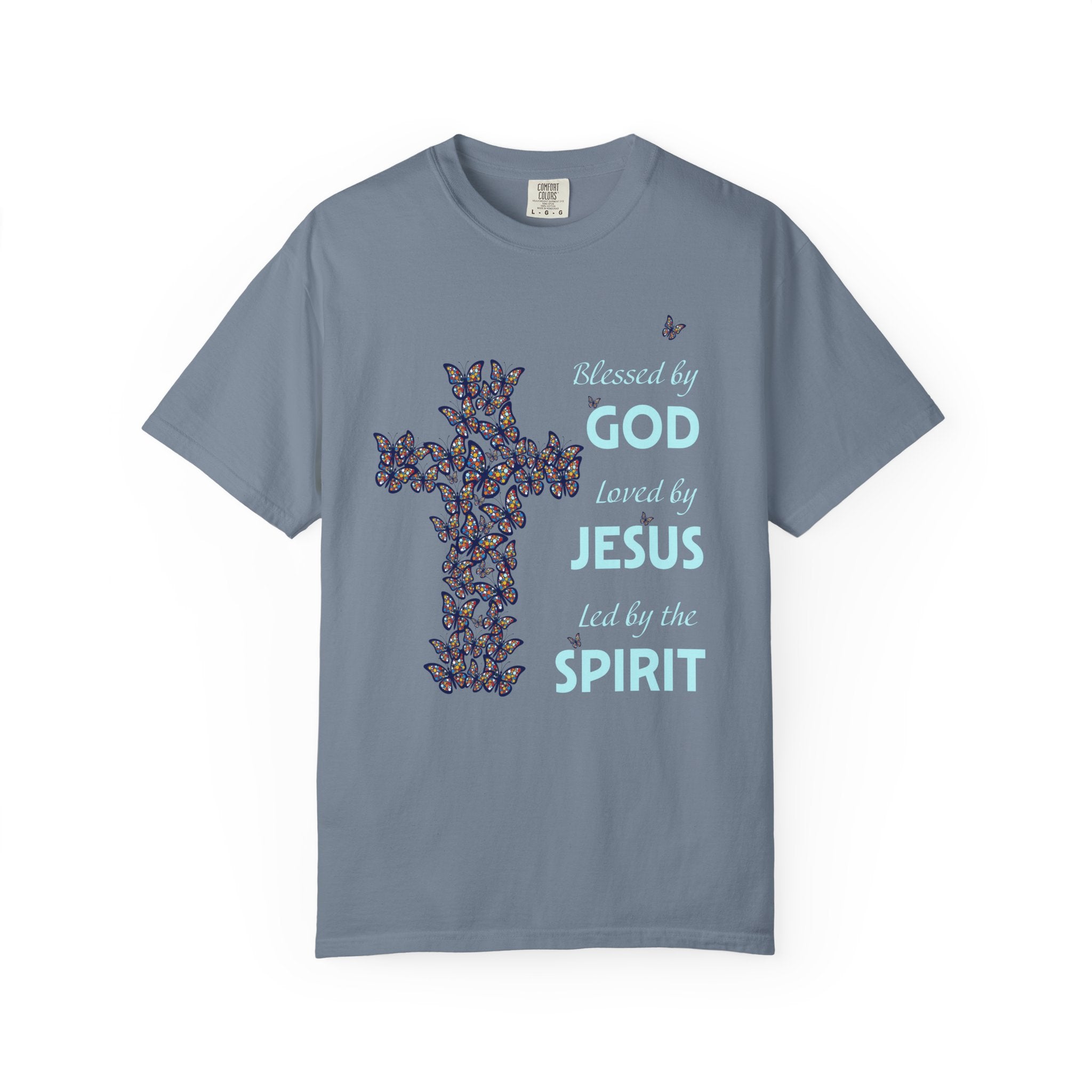 Pepper blue Christian t-shirt featuring butterfly cross graphic and faith message reading “Blessed by God, Loved by Jesus, Led by the Spirit”