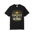 Black Christian graphic t-shirt featuring a gold crown and “Context Is King” typography design with radiating line details