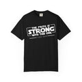 Black Christian t-shirt featuring “The Faith Is Strong With This One 1 Cor 16:13” graphic design in bold white text